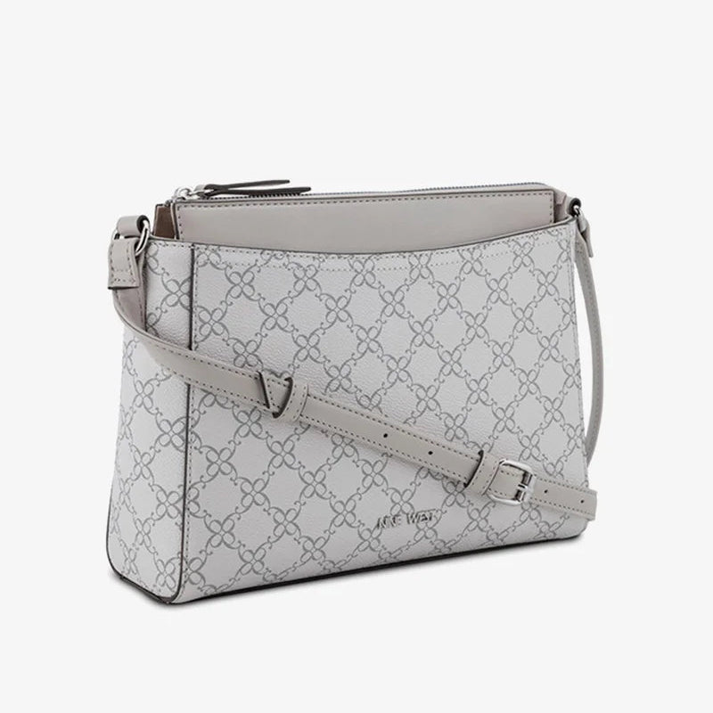 CARTERA NINE WEST DOVE LOGO
